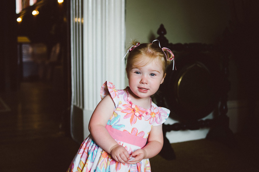 little girl looks into camera 