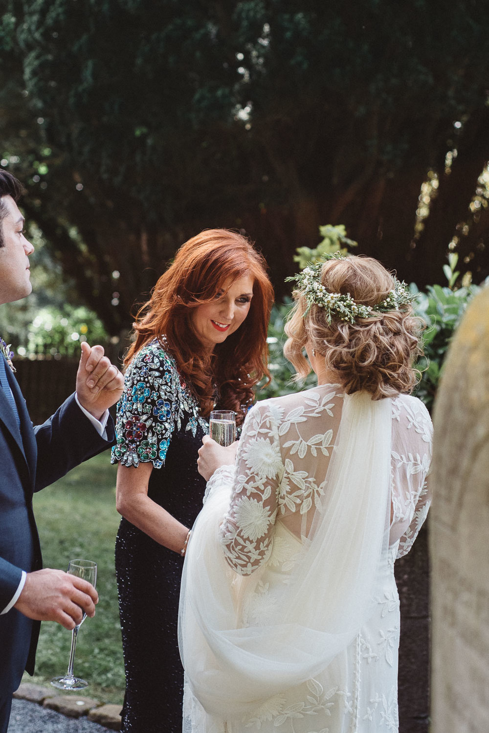 Wedding guests congratulates the bride. 
