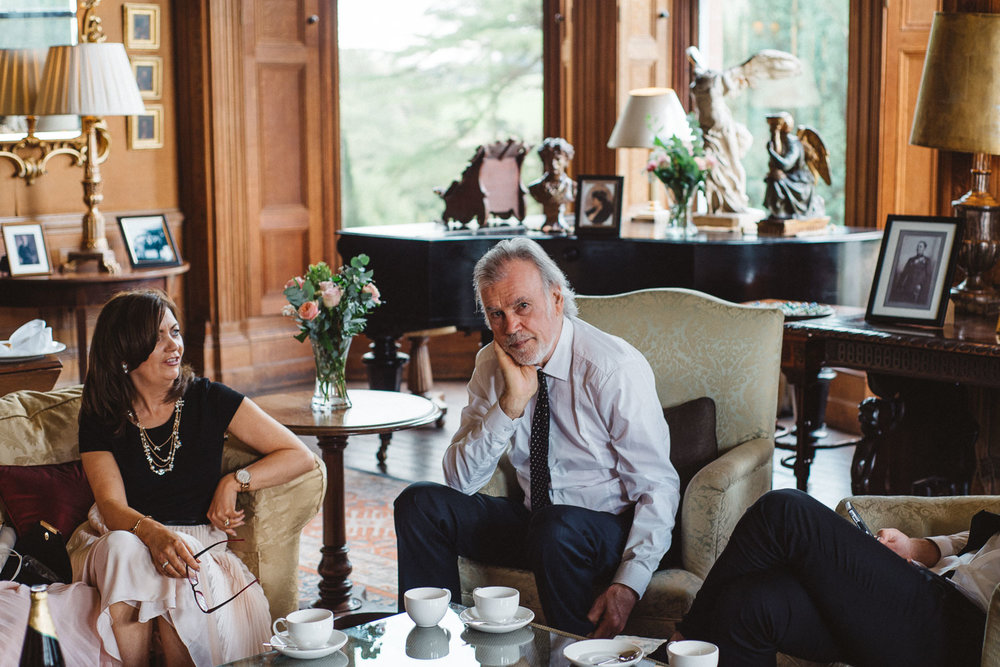wedding guest drinks tea 