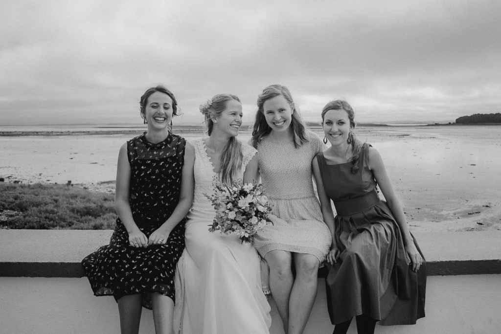 bride sitting with her friends 