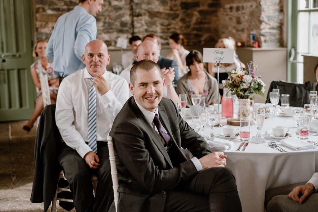 wedding guests enjoying speech 