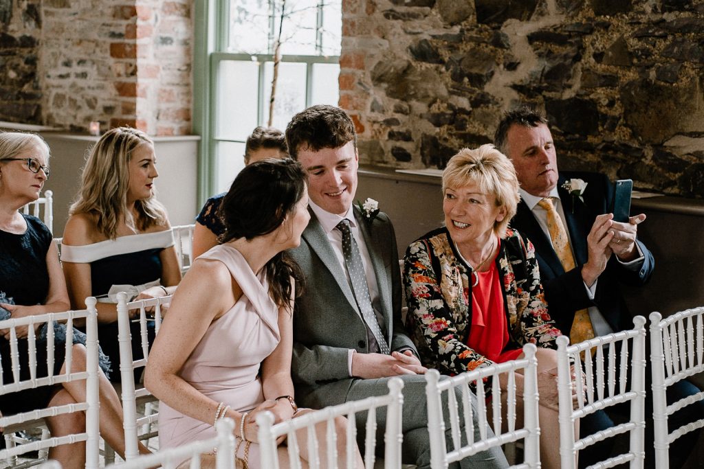 wedding guests chatting 