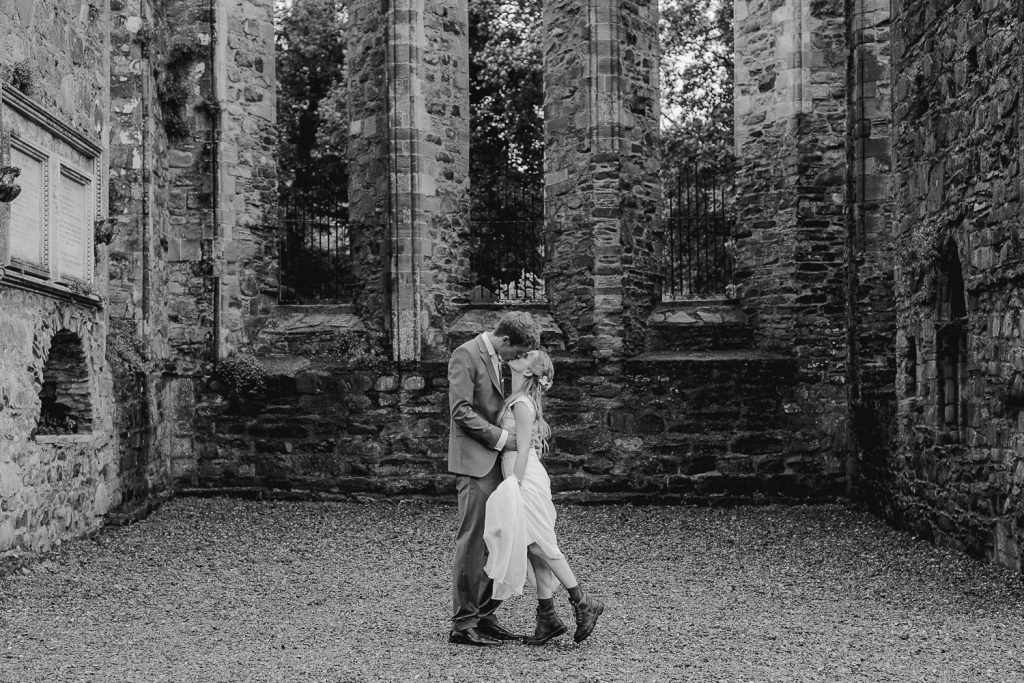 bride and groom in old ruins 
