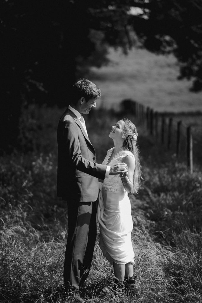 bride and groom enjoying the sunlight 