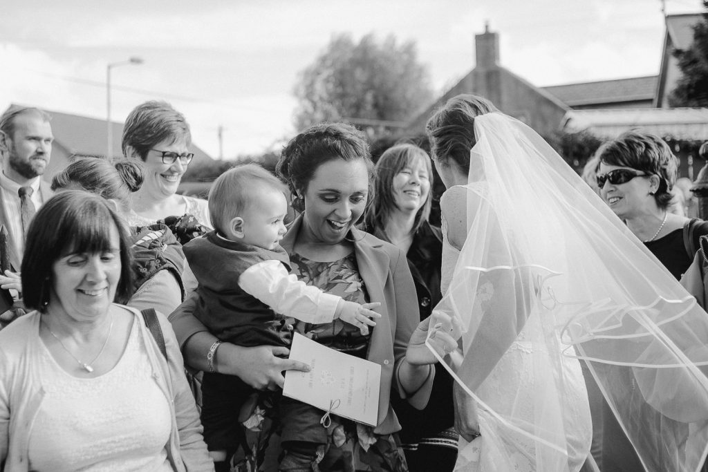 baby sees bride