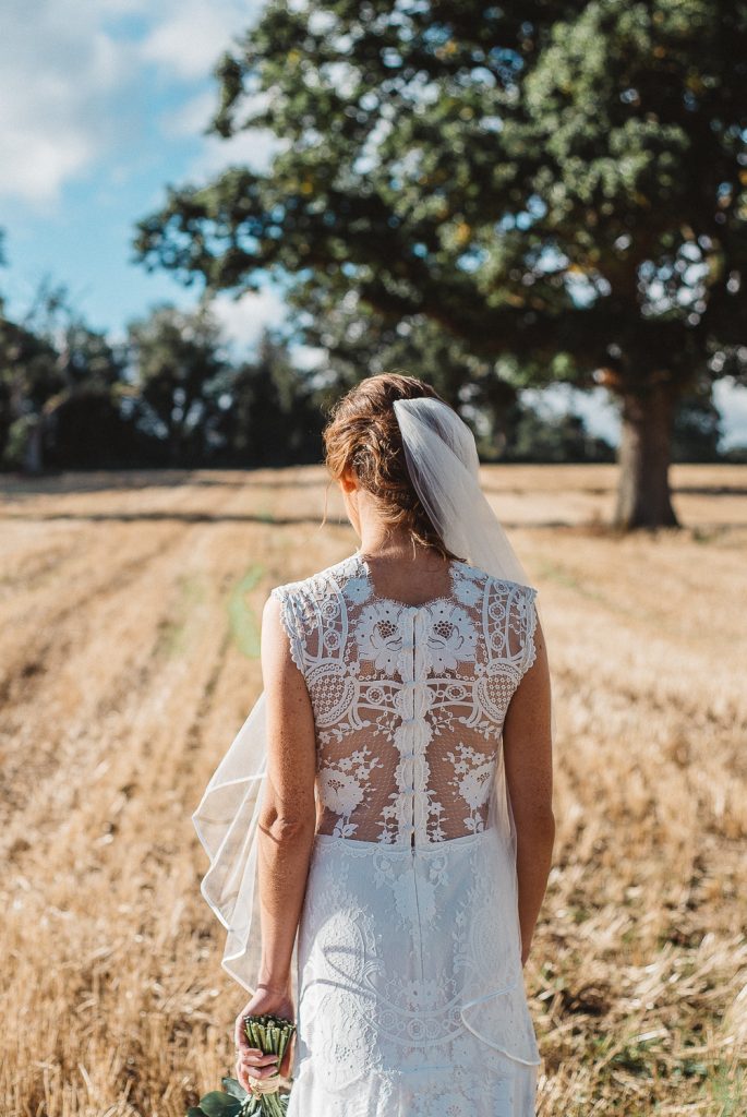 Close up of brides wedding dress. Gracehall wedding