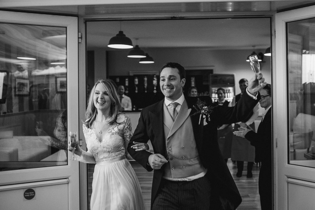 bride and groom walk into the the crannagh coleraine 