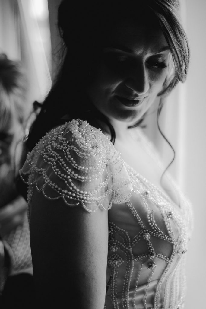 close up of detail on brides dress