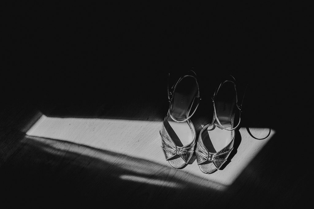 wedding shoes in hard sunlight