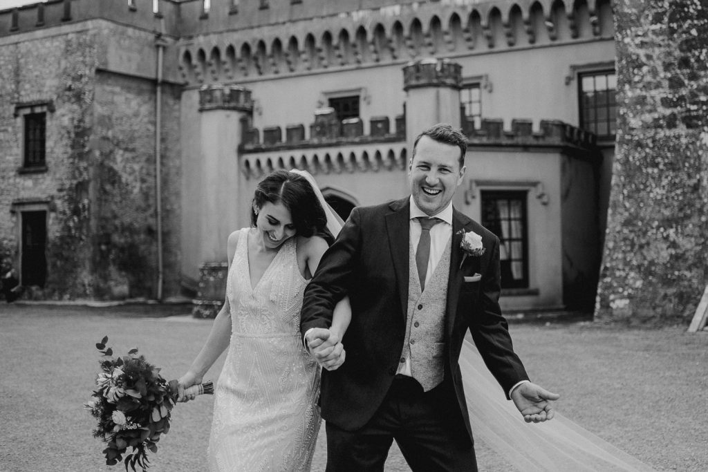bride and groom laughing