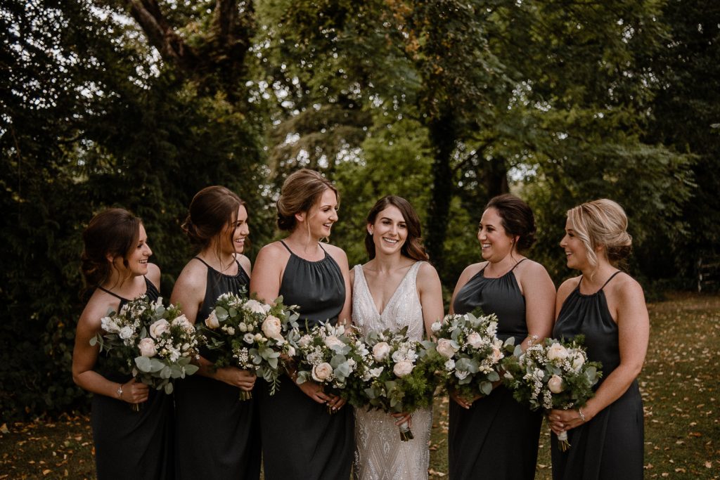 close up of bride and bridesmaids laughing